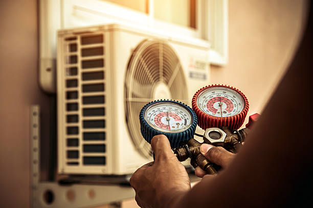 Professional Hvac technician working in Hamilton, MO